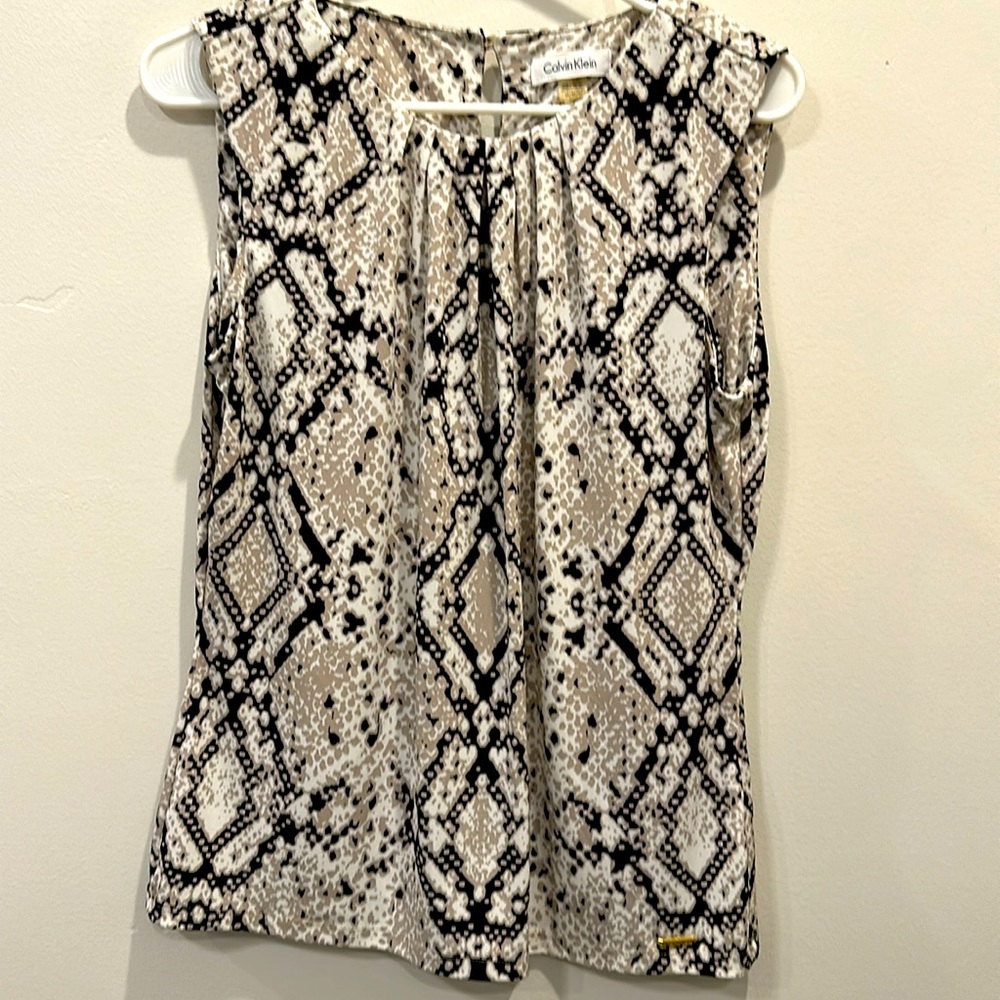 Calvin Klein. Size M. Snakeskin print. No flaws. Black, tan and white.